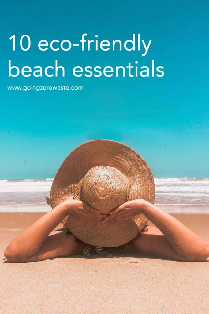 A photo of a woman in a sun hat, one of the featured beach Day Essentials, with overlay text reading "10 eco-friendly beach essentials"